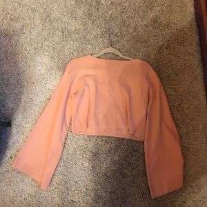 Light pink cropped bell sleeve sweater